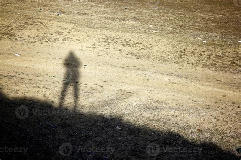 Lonely Shadow Of A Man Standing On The Hill Human Shadow On The Ground