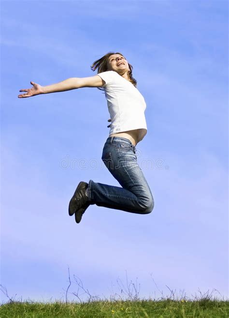 Happily Jumping Fit Attractive Woman Stock Photo Image Of