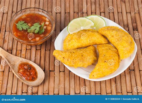 Colombian Empanada With Spicy Sauce Stock Photo Image Of Argentinian