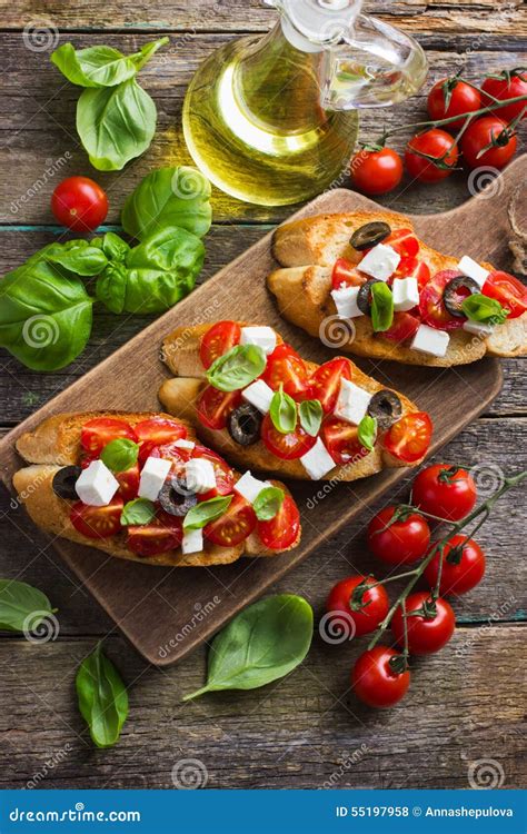 Bruschetta With Tomato Feta Cheese And Basil Stock Photo Image Of