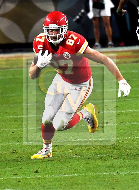 Chiefs tight end Travis Kelce receives a pass - Gold Medal Impressions