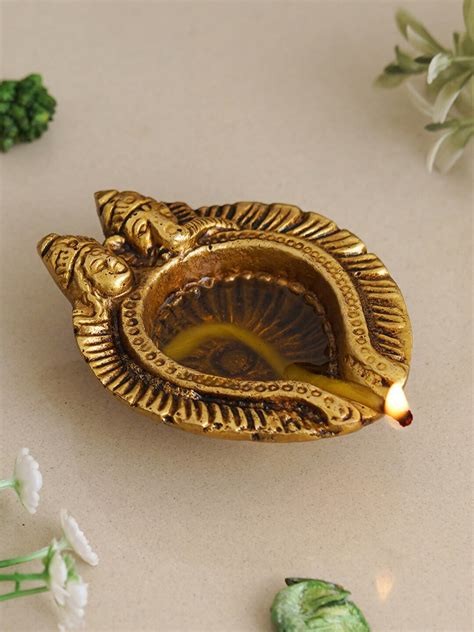 Buy Ecraftindia Beige Lakshmi Lord Ganesha Diyas Pooja Essentials