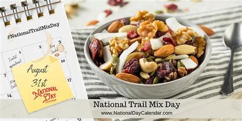 the national trail mix - day calendar is next to a bowl of nuts and almonds