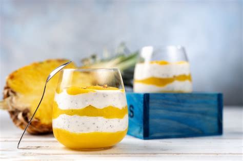 Premium Photo Mango Smoothie With Yogurt In Two Glasses