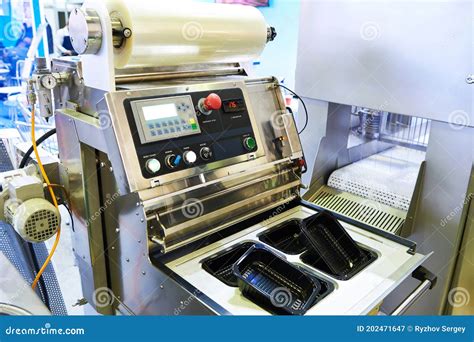 Food packaging equipment stock image. Image of buttons - 202471647