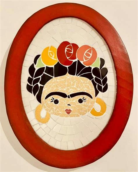 An Art Piece With A Woman S Face Painted On The Side And Circles Around It