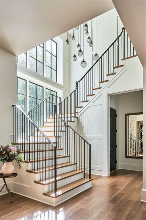 Grand Staircase With Statement Chandelier Staircase Landing