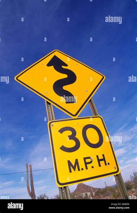 Winding Road Warning Sign 30 Mph Stock Photo Alamy