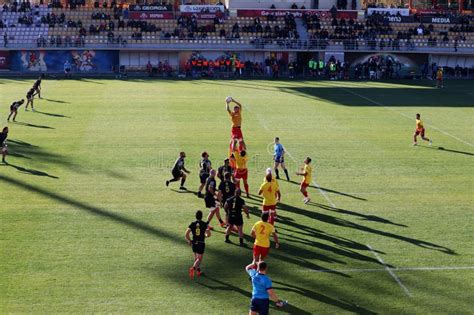 A Rugby Player Catches the Ball from the Outfield. Black Lion V Iberians. Avchala Stadium ...