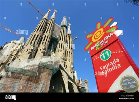 Barcelona City Tour sightseeing bus stop sign for tourists at the Basilica de la Sagrada Familia ...