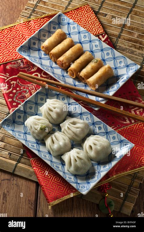 Steamed Dumplings And Spring Rolls Dim Sum Stock Photo Alamy