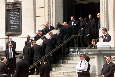 R&B singer Aaliyah's coffin being carried out of St. Ignatius Loyola ...