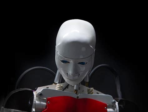 Premium Photo | Android robot made of modern materials on a black ...