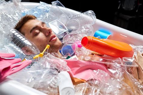 Naked Man Lie Anong Empty Plastic Bottles And Trash Stock Photo Image