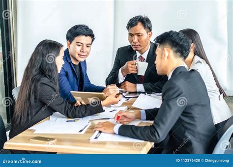 Corporate Business Team And Manager In A Meeting At Office Stock Photo