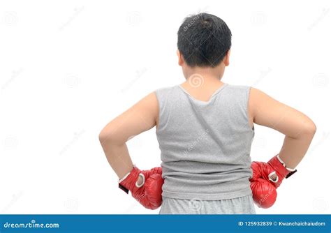 Parte Trasera Del Muchacho Gordo Que Lleva Guantes De Boxeo Rojos I