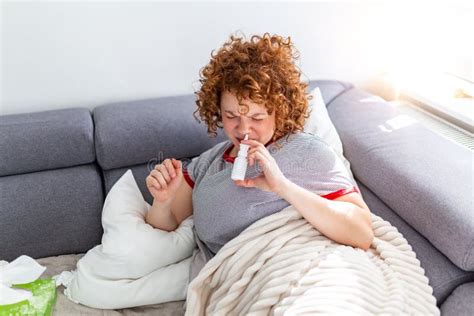 Woman Is Having Allergies And She Is Using Nasal Spray To Help Herself