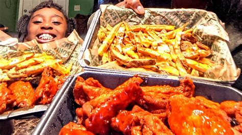 Eating Wingstop S Buffalo Wings And Voodoo Fries Youtube