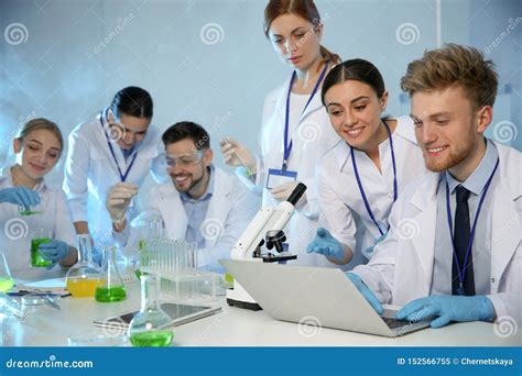 Group Of Scientists Working In Modern Laboratory Stock Image Image Of