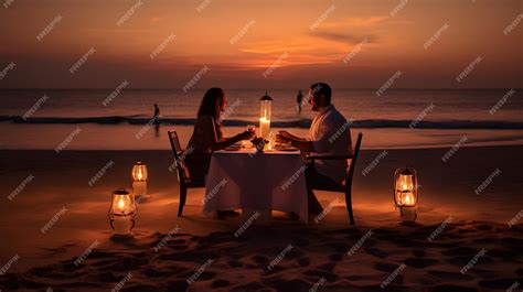Premium Ai Image Couple Enjoying A Romantic Candlelit Dinner On The Beach