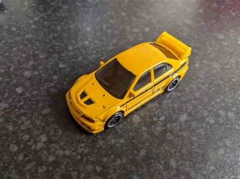 HOT WHEELS JCB58 2024 90S Street Scene 2 5 Mitsubishi Lancer Evolution VI 7 99 PicClick UK