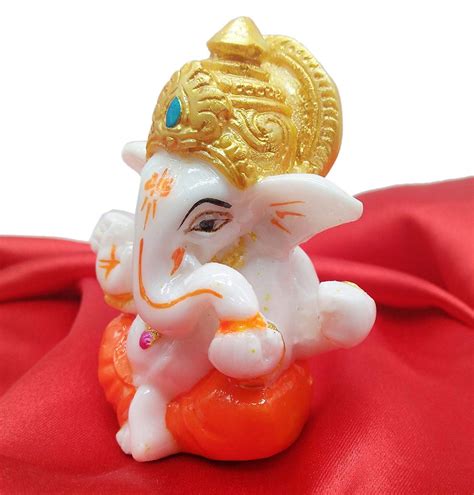 Beckon Venture Handcrafted Lord Ganesha Statue White Orange