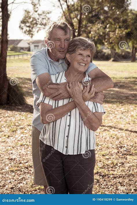 Portrait Of Elderly Senior Couple Enjoying Retirement Lifestyle Feeling Happy Aging Together