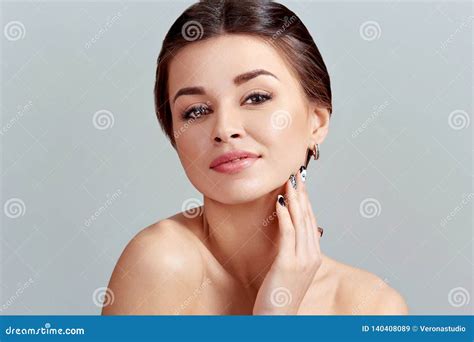 Facial Care Female Applying Cream And Smiling Beauty Face Portrait