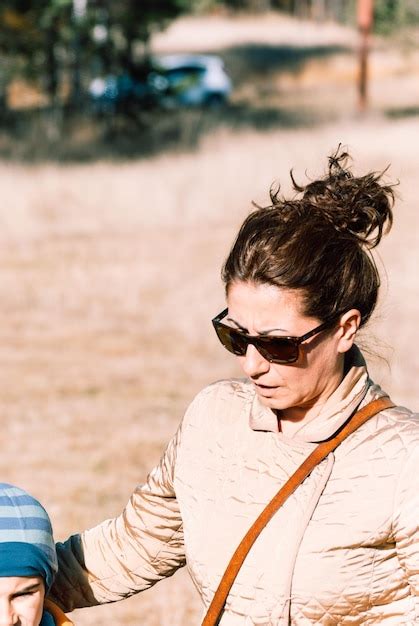 Premium Photo Close Up Of Woman With Son Standing Outdoors