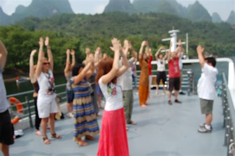 Qigong Practice On Cruise Boat On Li River China Blue Mountain Feng