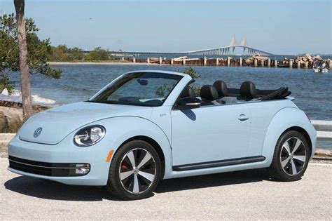 baby blue volkswagen beetle car - Maren Huynh