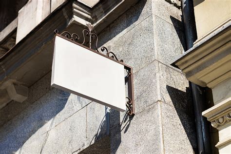 Perspective View Of A Rectangle Shop Sign Mockup Free Download