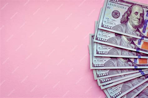 Premium Photo A Dollar Banknotes On A Pink Background Place For Text