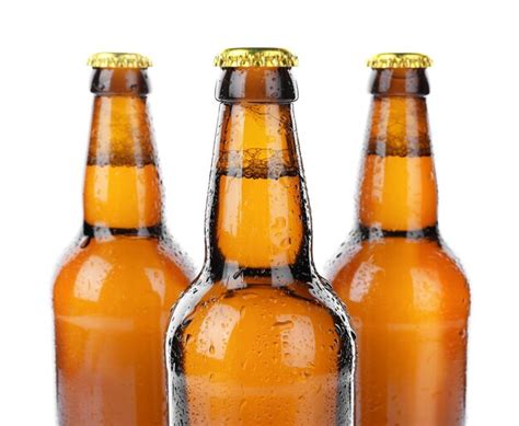 Premium Photo Glass Bottles Of Beer Isolated On White