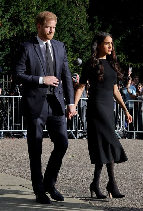 Meghan Markle Wears Black Midi Dress At Queen Elizabeth Floral Tribute