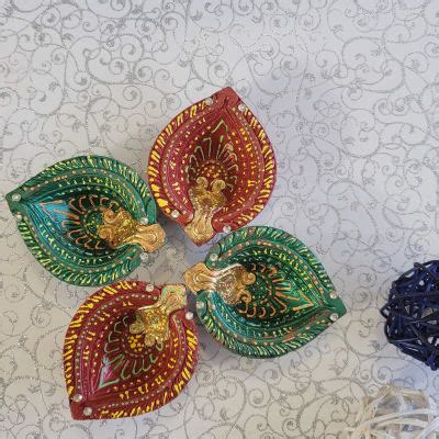 Buy Send Set Of Four Beautiful Diyas Online IGP JVS1268247