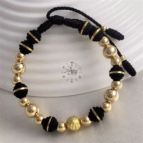 PULSERA CON NEOPRENO Y BALINES DE ORO LAMINADO 18K