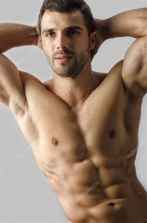 Strong Bodybuilder Man With Perfect Abs Shoulders Biceps Triceps And