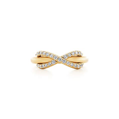 Tiffany Infinity ring in 18k gold with diamonds. | Tiffany & Co.