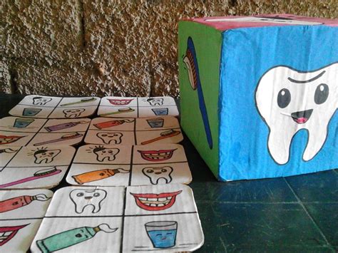 Juego Didáctico Para El Taller De Higiene Bucal Los Cartones Y El Dado Con Los Dibujos