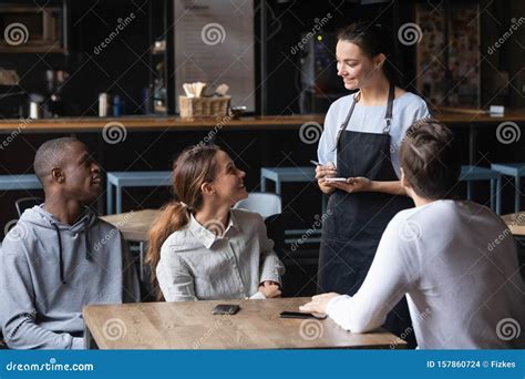 Diverse Friends Making Order In Cafe Smiling Waitress Serving