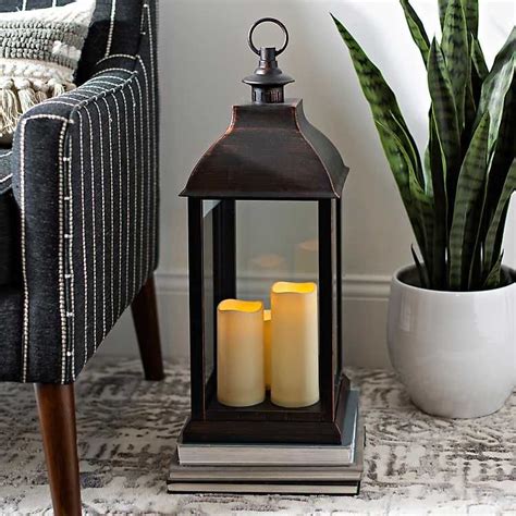 Bronze Lantern With Led Pillar Candles From Kirklands Lanterns Decor