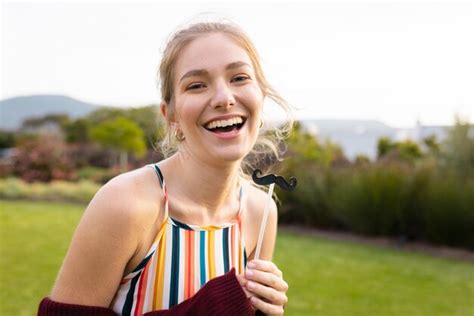 Premium Photo Portrait Of Happy Caucasian Woman With Fake Moustache