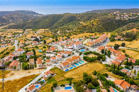 Cyprus. Pissouri village in the valley at the foot of the mountains ...