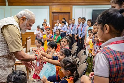 Narendra Modi | Prime Minister Narendra Modi celebrates Raksha Bandhan with school children ...