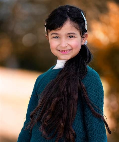 Premium Photo Portrait Of Smiling Woman Standing Outdoors