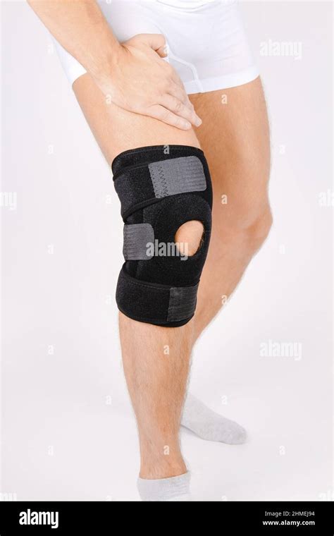 Knee Support Brace On Leg Isolated On White Background Elastic