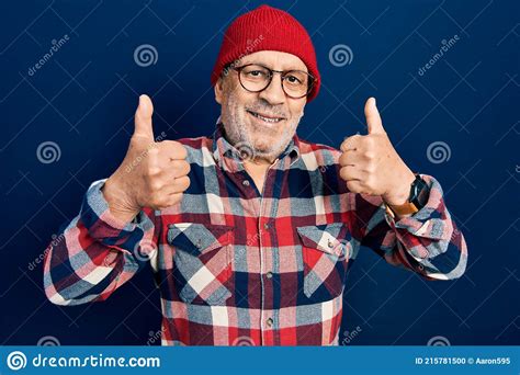 Handsome Mature Man Wearing Hipster Look With Wool Cap Success Sign