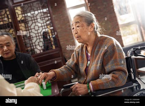 Happy Old People Playing Mahjong Stock Photo Alamy
