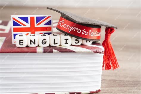 Premium Photo | English book with graduate hat learning and tutorial ...